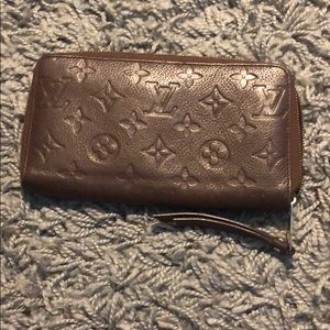 zipped continental wallet brown leather